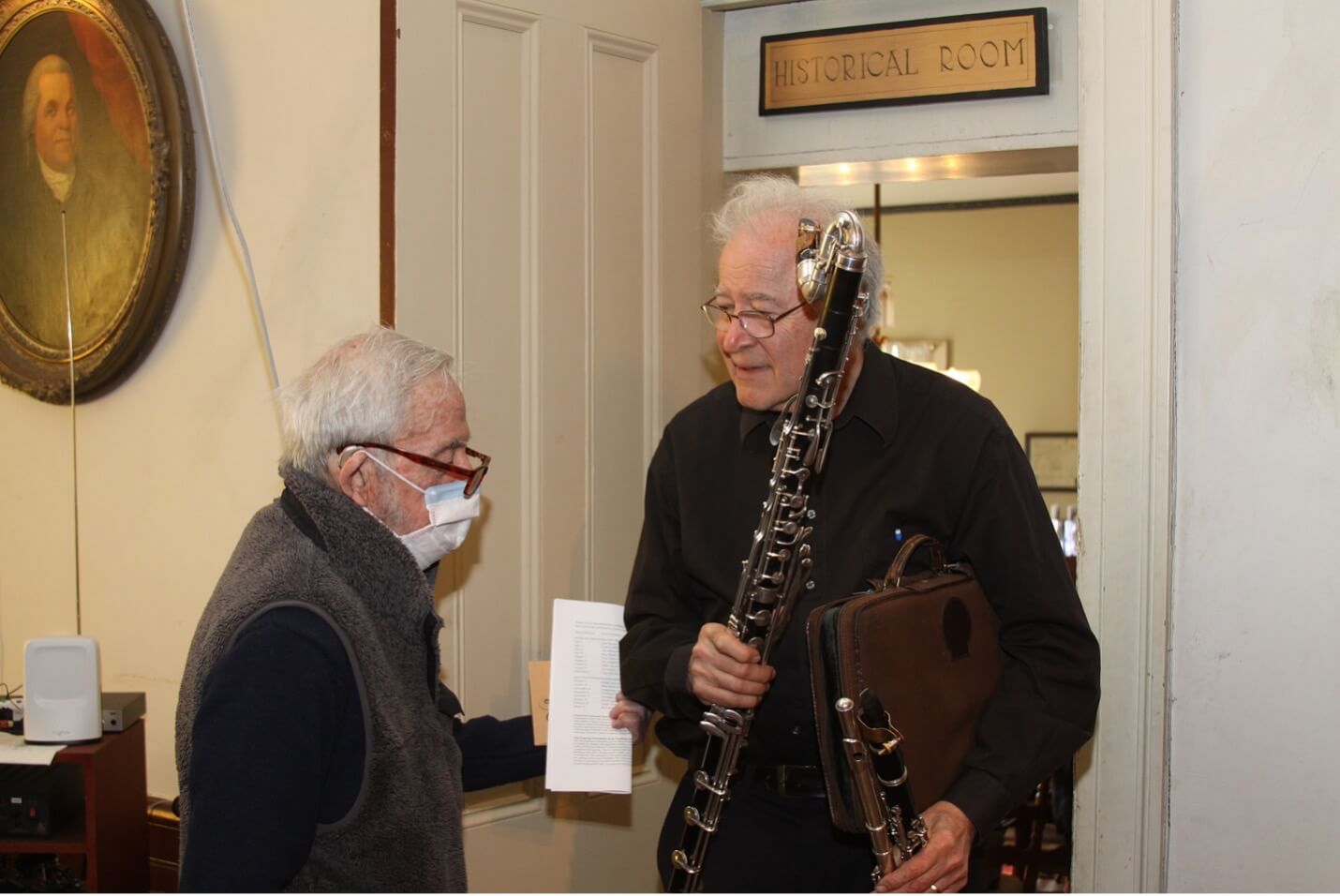 Donor Phil Cutter chatting with Stephen Bates, who played the clarinet and flute